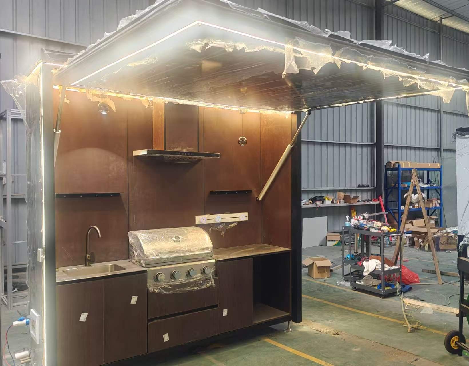 Completed outdoor kitchen undergoing a factory function check